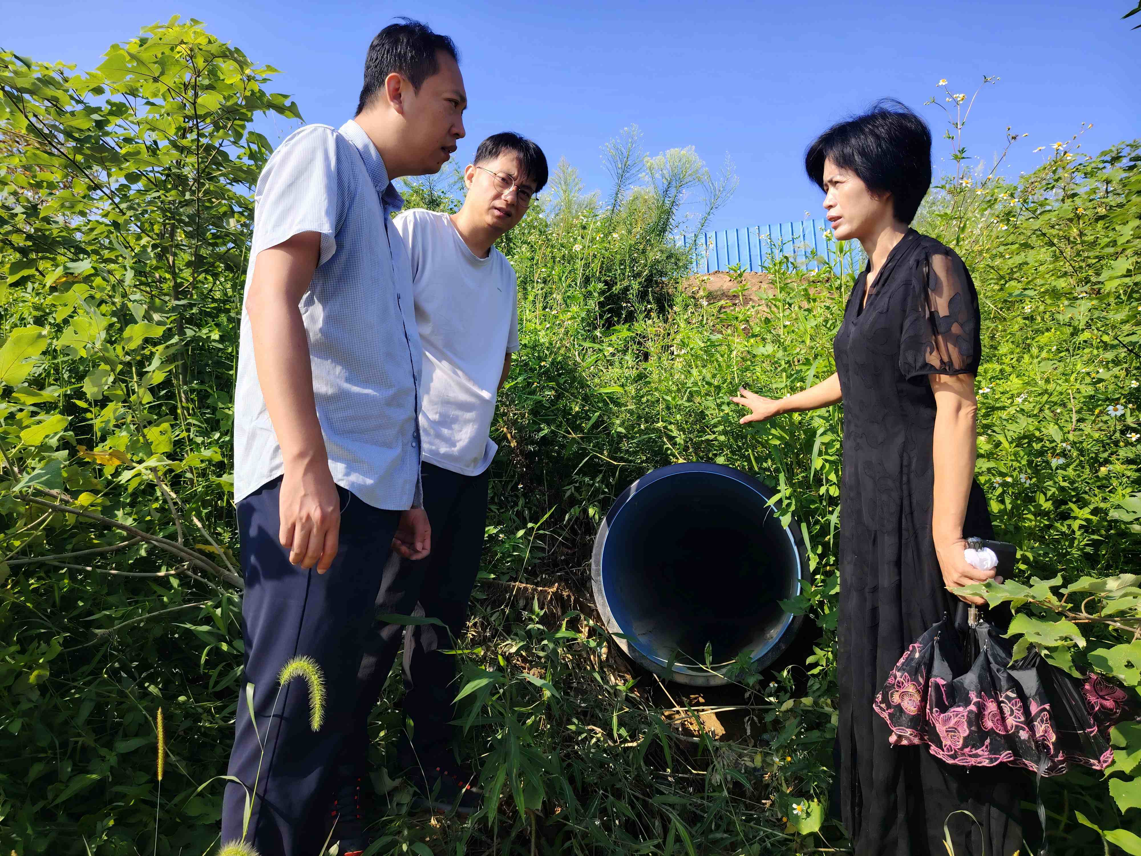 8月27日,到融安县城河西新民三区河堤开展跟踪视察现场图片。(覃莉 摄)(1).jpg